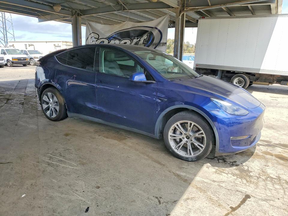 Photo 4 from auction – 2022 TESLA MODEL Y with VIN 7SAYGAEE9NF559390
