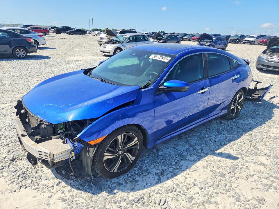 HONDA CIVIC 2016 with VIN 2HGFC1F90GH644148 - Photo from auction