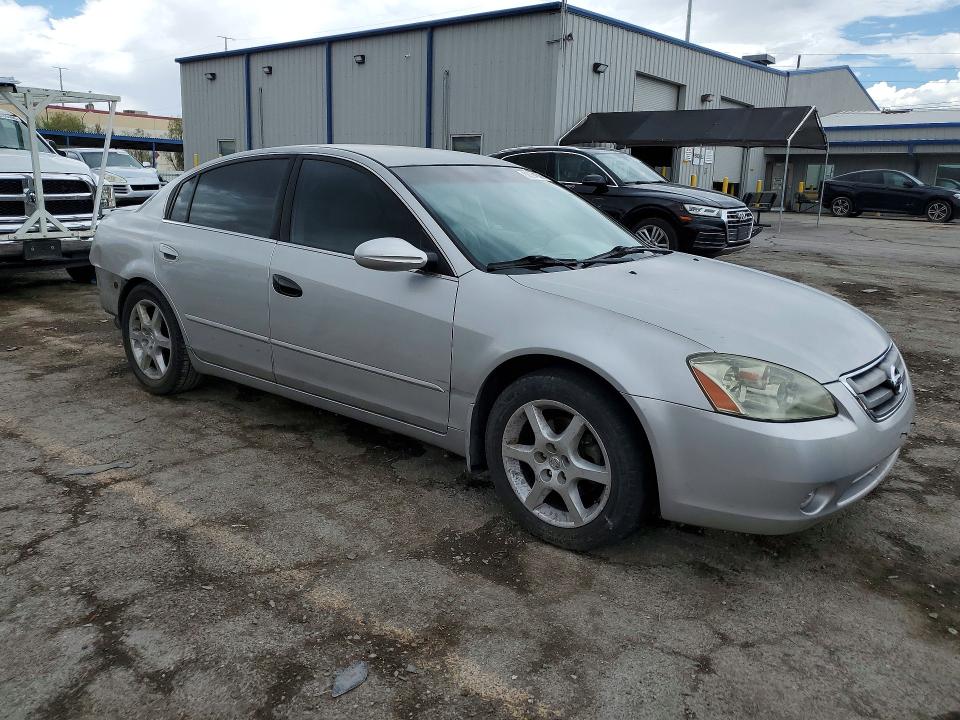 Photo 4 from auction – 2004 NISSAN ALTIMA with VIN 1N4BL11D14C143461