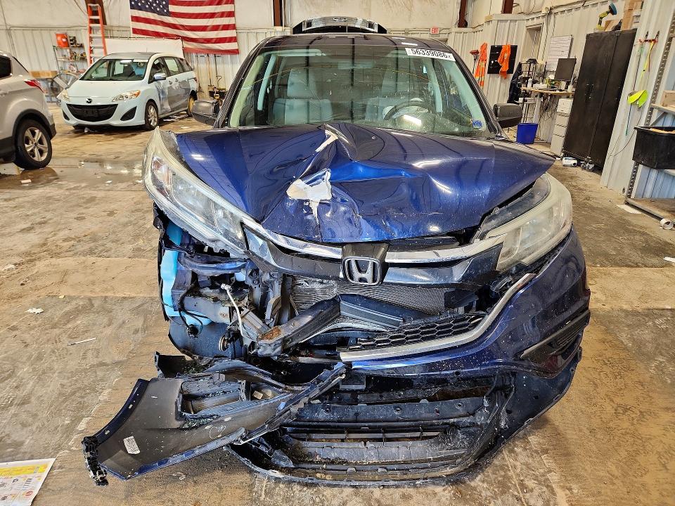 Photo 5 from auction – 2016 HONDA CR-V with VIN 5J6RM4H43GL081766