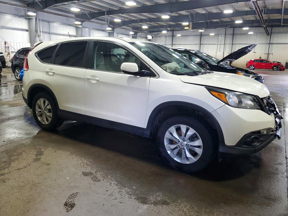 Photo 4 from auction – 2014 HONDA CR-V with VIN 5J6RM4H58EL027319