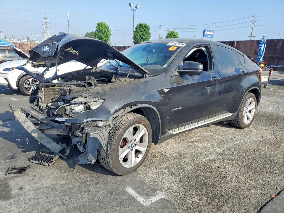 BMW X6 2014 with VIN 5UXFG2C53E0C43352 - Photo from auction