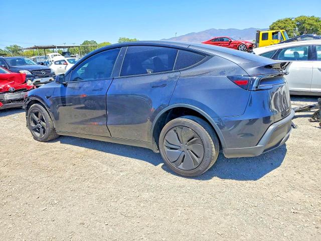 Photo 2 from auction – 2026 TESLA MODEL Y with VIN 7SAYGDED4TF443424