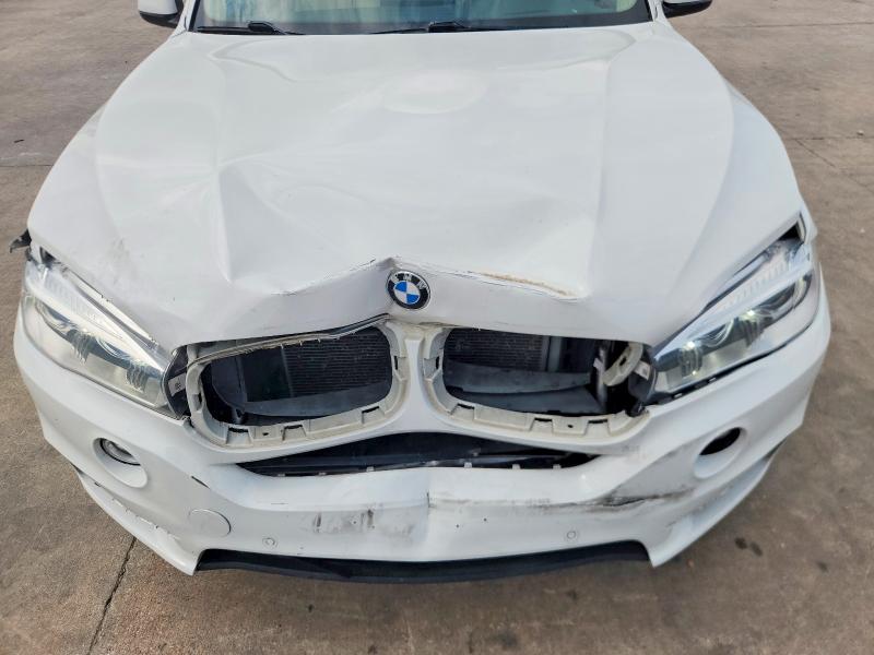 Photo 11 from auction – 2015 BMW X5 with VIN 5UXKR0C59F0P18627