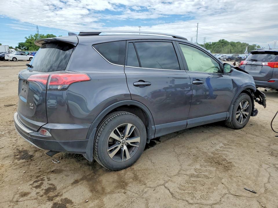 Photo 3 from auction – 2018 TOYOTA RAV4 with VIN JTMRFREV4JJ237679