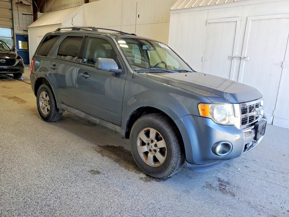 Photo 4 from auction – 2010 FORD ESCAPE with VIN 1FMCU9E74AKC25356
