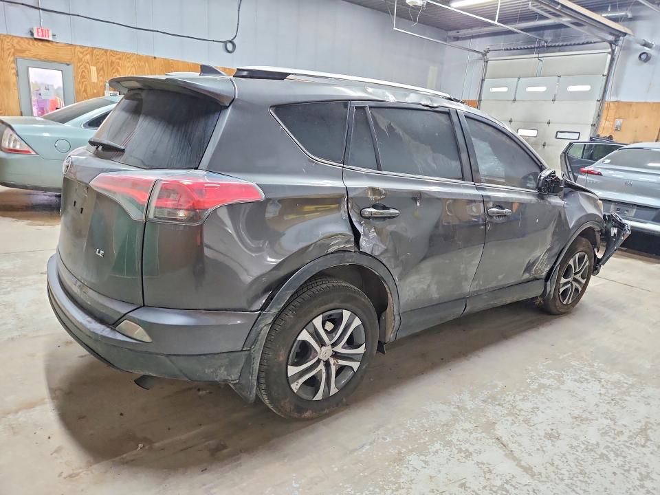Photo 3 from auction – 2016 TOYOTA RAV4 with VIN JTMZFREV7GJ094641