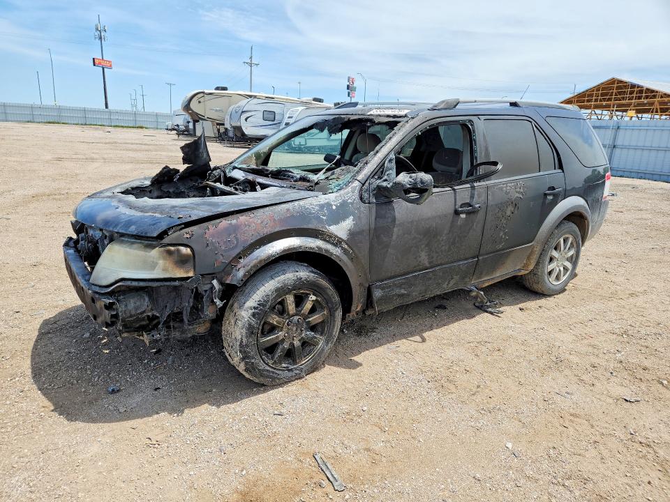 FORD TAURUS X 2008 with VIN 1FMDK02W68GA39963 - Photo from auction
