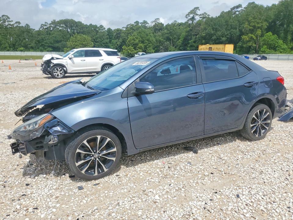 TOYOTA COROLLA 2018 con VIN 5YFBURHE5JP846083 - Foto de la subasta