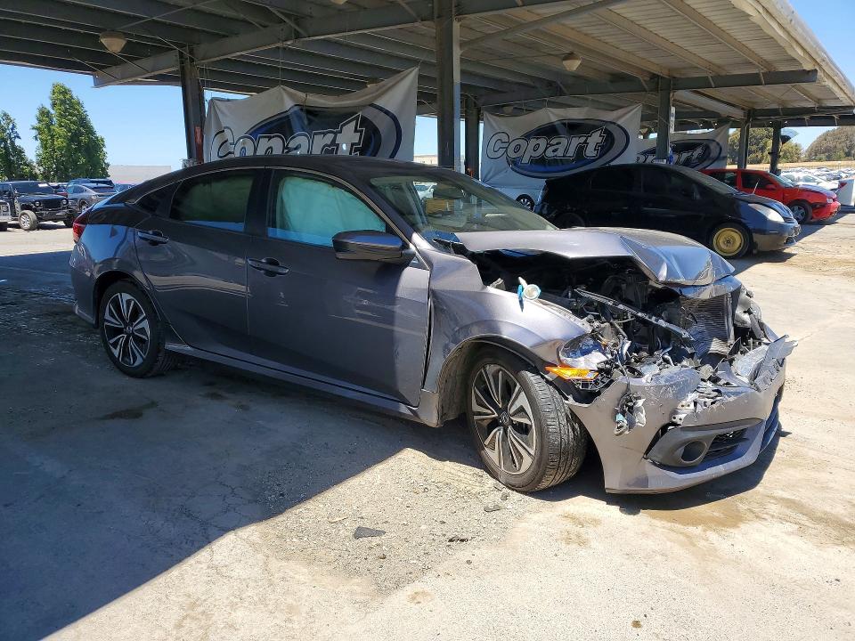 Photo 4 from auction – 2017 HONDA CIVIC with VIN 19XFC1F35HE202909