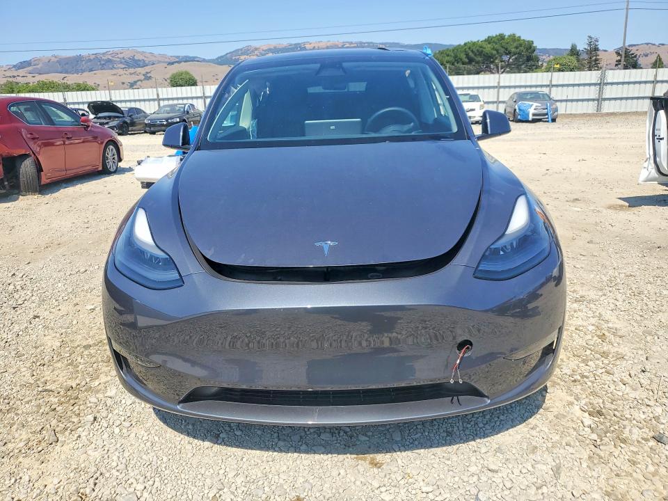 Photo 5 from auction – 2023 TESLA MODEL Y with VIN 7SAYGAEE6PF619760