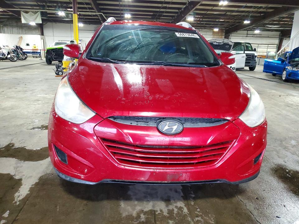 Photo 5 from auction – 2012 HYUNDAI TUCSON with VIN KM8JUCAC7CU383530