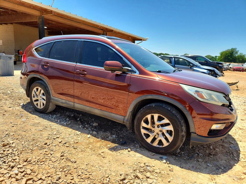 Photo 4 from auction – 2015 HONDA CR-V with VIN 2HKRM3H72FH550200