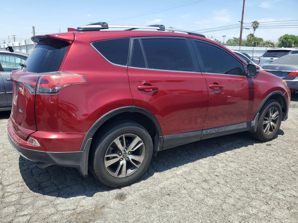 Photo 3 from auction – 2018 TOYOTA RAV4 with VIN 2T3WFREV5JW477411