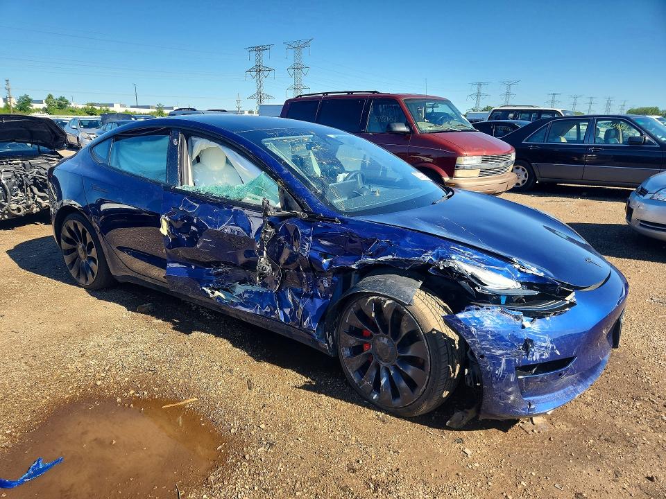 Фото 4 с аукциона – 2022 TESLA MODEL 3 с VIN 5YJ3E1EC7NF266762