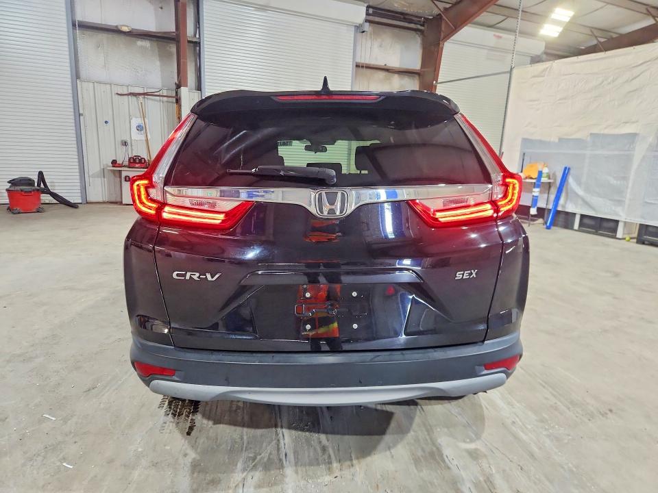 Photo 6 from auction – 2018 HONDA CR-V with VIN 2HKRW2H53JH698481