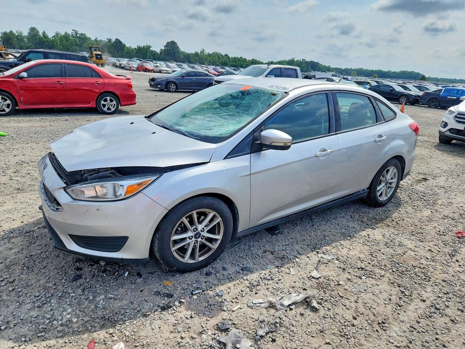 FORD FOCUS 2016 with VIN 1FADP3F2XGL389557 - Photo from auction