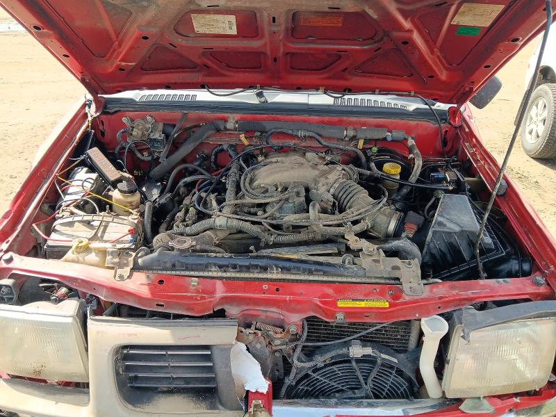 Photo 11 from auction – 2000 NISSAN FRONTIER with VIN 1N6ED26Y6YC429573