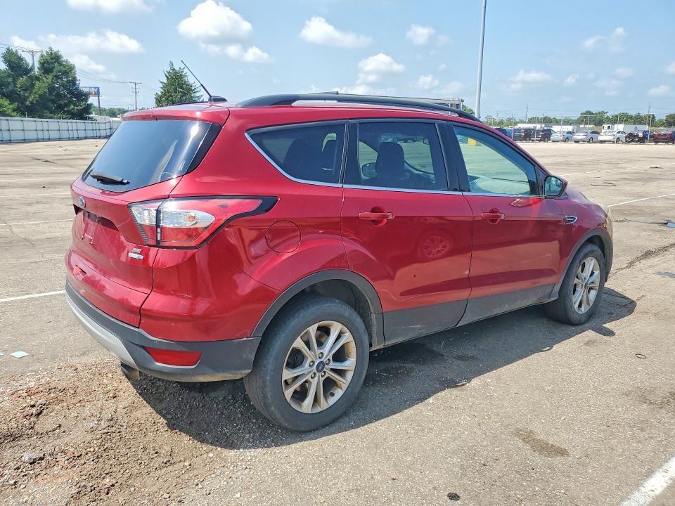 Photo 3 from auction – 2018 FORD ESCAPE with VIN 1FMCU9GD3JUC33598