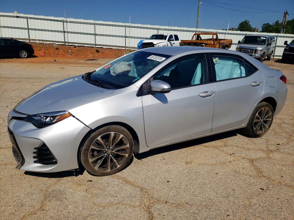 TOYOTA COROLLA 2018 with VIN 2T1BURHE2JC065070 - Photo from auction