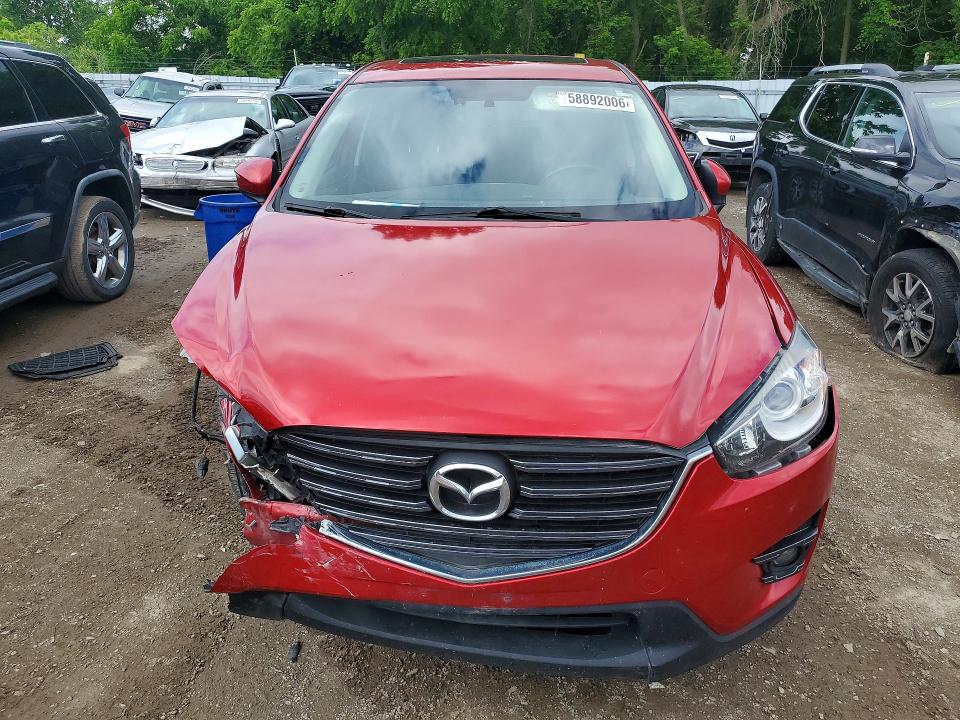Photo 5 from auction – 2016 MAZDA CX-5 with VIN JM3KE2CY2G0891787