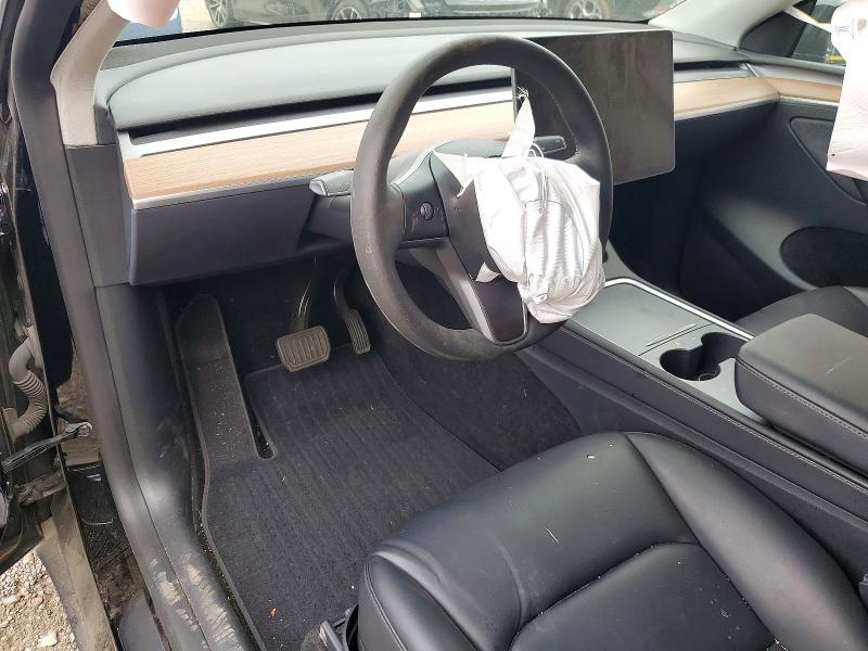 Photo 8 from auction – 2023 TESLA MODEL Y with VIN 7SAYGDED2PF934077