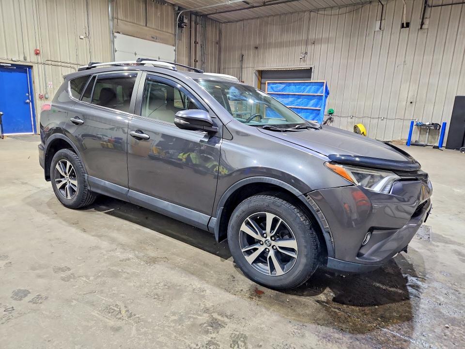 Photo 4 from auction – 2016 TOYOTA RAV4 with VIN 2T3RFREV2GW499923
