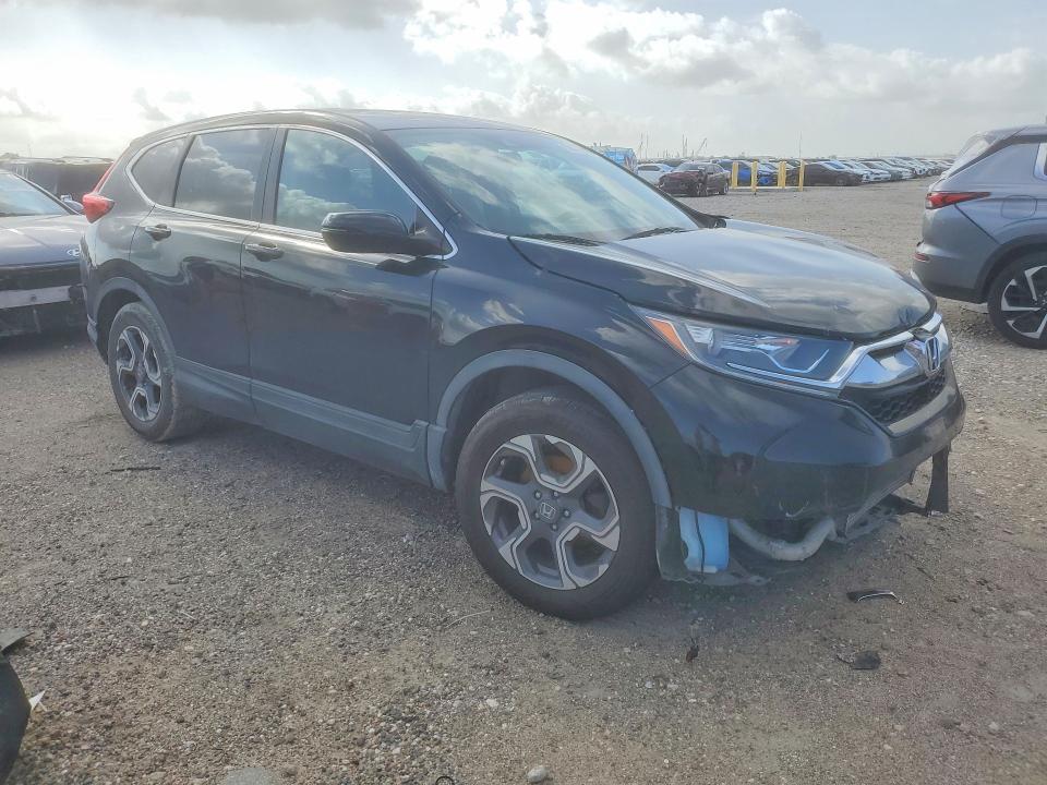 Photo 4 from auction – 2019 HONDA CR-V with VIN 7FARW2H50KE029055