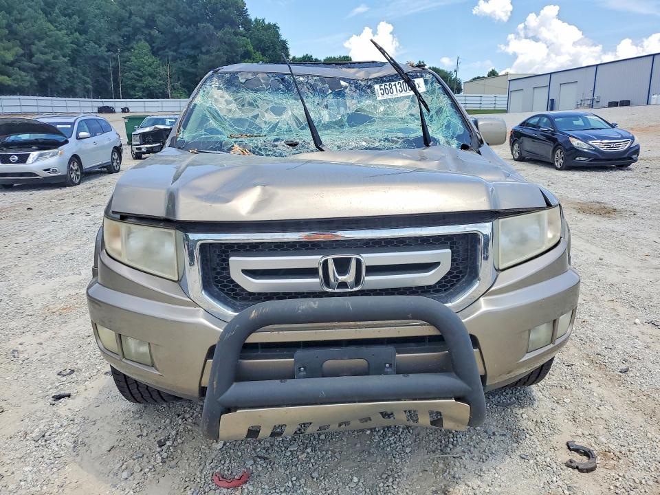 Photo 5 from auction – 2009 HONDA RIDGELINE with VIN 5FPYK165X9B109559