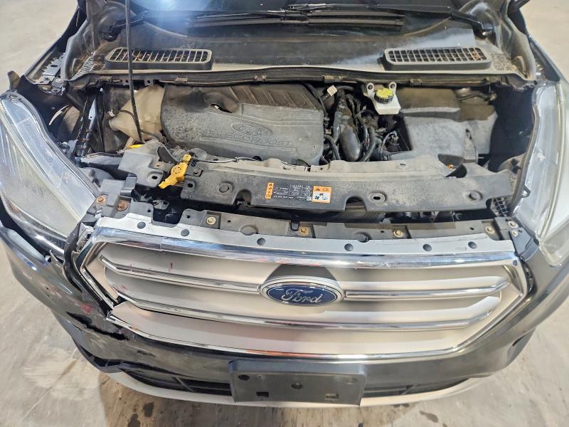 Photo 12 from auction – 2017 FORD ESCAPE with VIN 1FMCU9GD6HUE61458