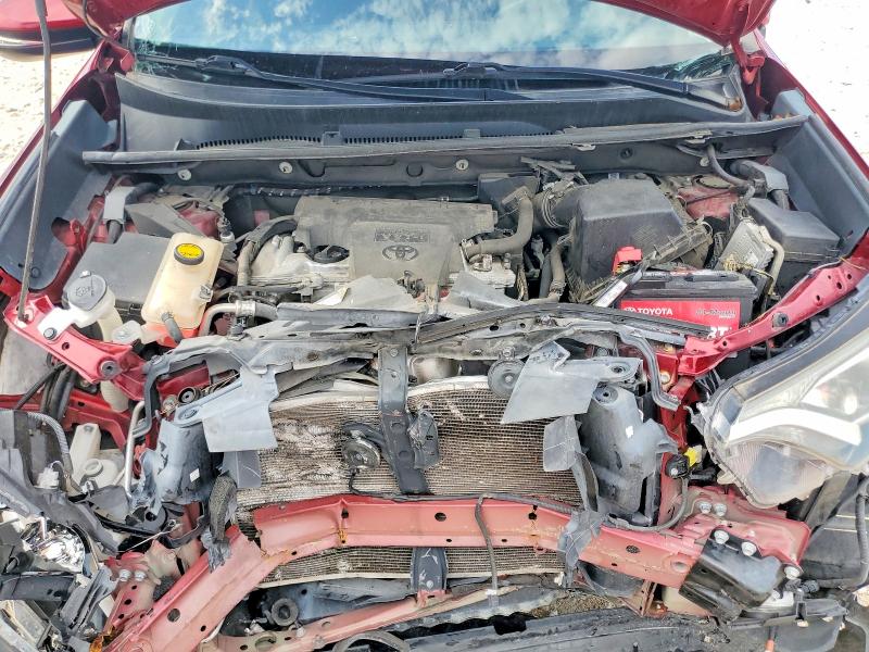 Photo 12 from auction – 2018 TOYOTA RAV4 with VIN 2T3WFREV0JW433526