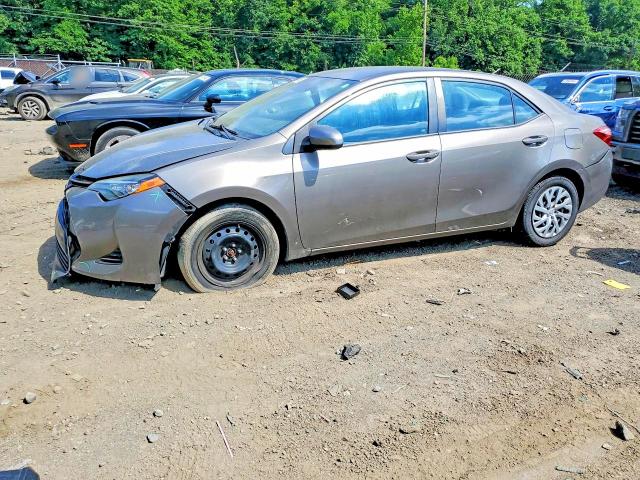 TOYOTA COROLLA 2017 with VIN 2T1BURHE8HC779991 - Photo from auction