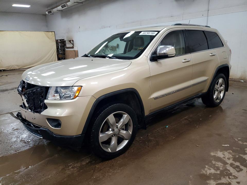 JEEP GRAND CHEROKEE 2011 with VIN 1J4RR6GG9BC557942 - Photo from auction