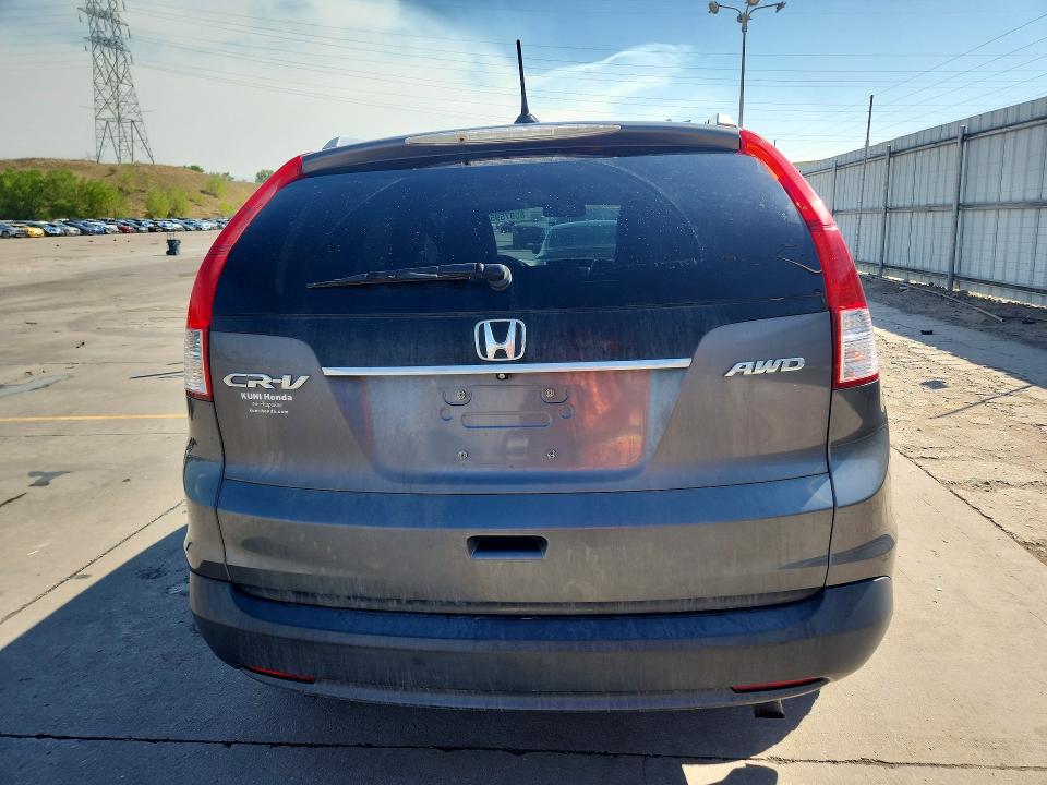 Photo 6 from auction – 2014 HONDA CR-V with VIN 2HKRM4H79EH650430