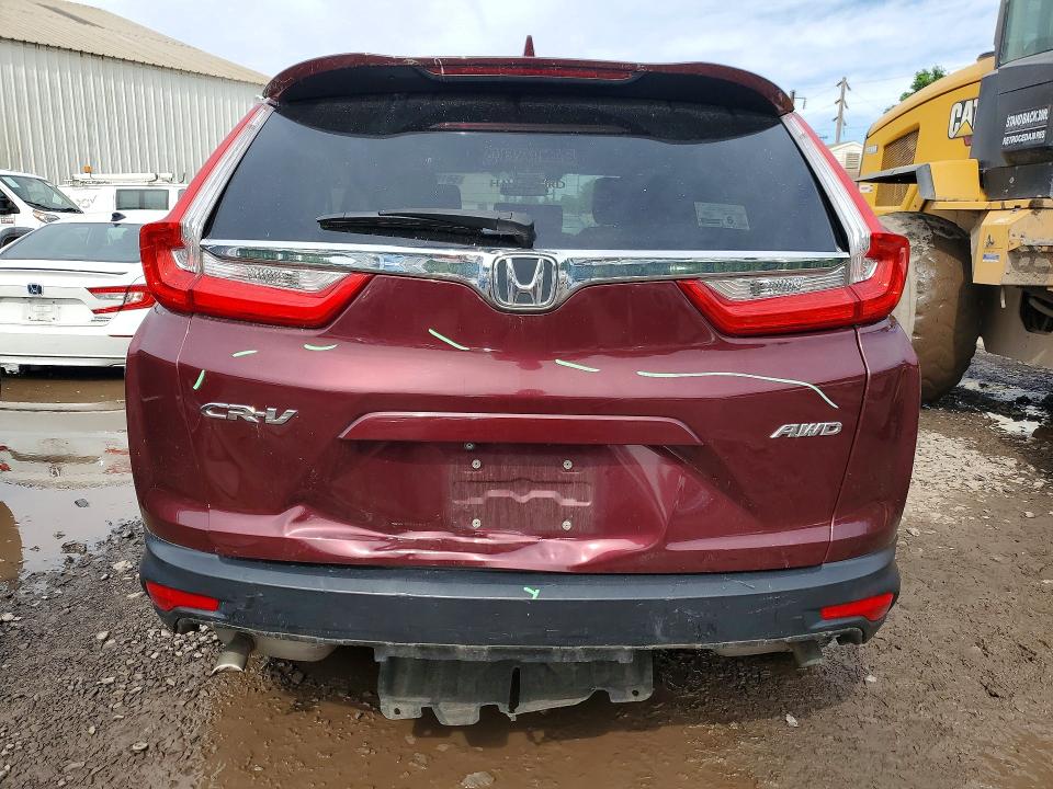 Photo 6 from auction – 2017 HONDA CR-V with VIN 2HKRW2H54HH616476
