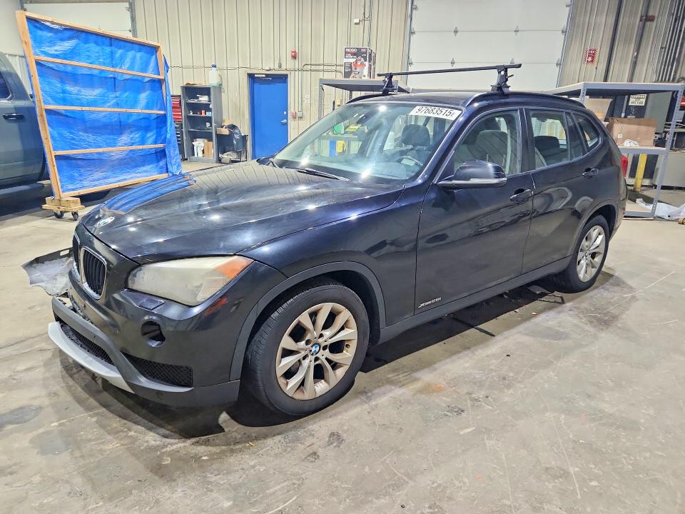 BMW X1 2013 with VIN WBAVL1C58DVR92274 - Photo from auction