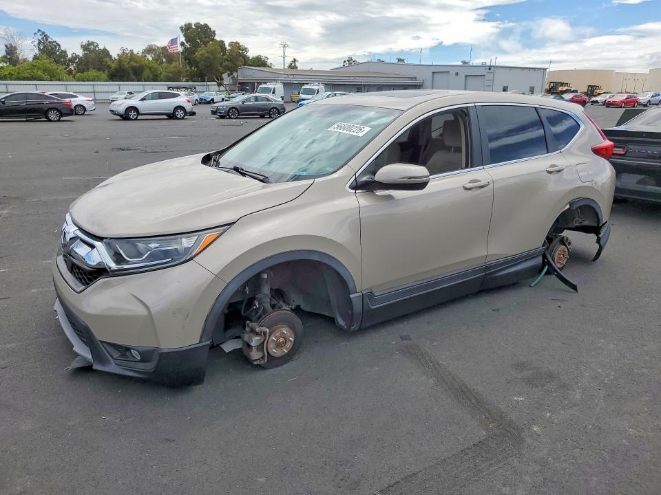 Photo 1 from auction – 2018 HONDA CR-V with VIN 5J6RW2H57JL016160