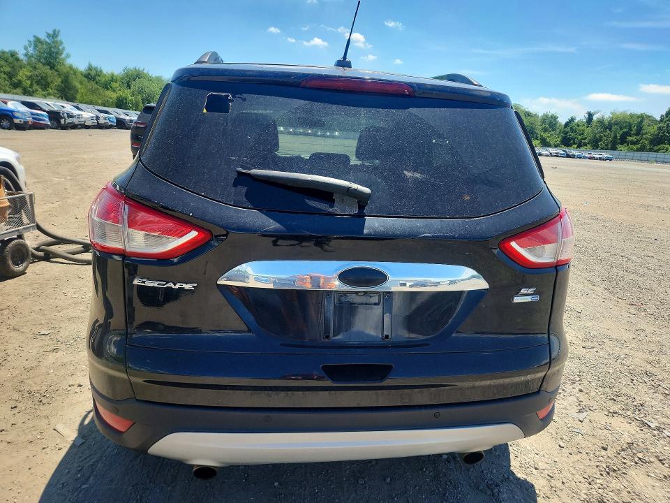 Photo 6 from auction – 2014 FORD ESCAPE with VIN 1FMCU9GX9EUD05484