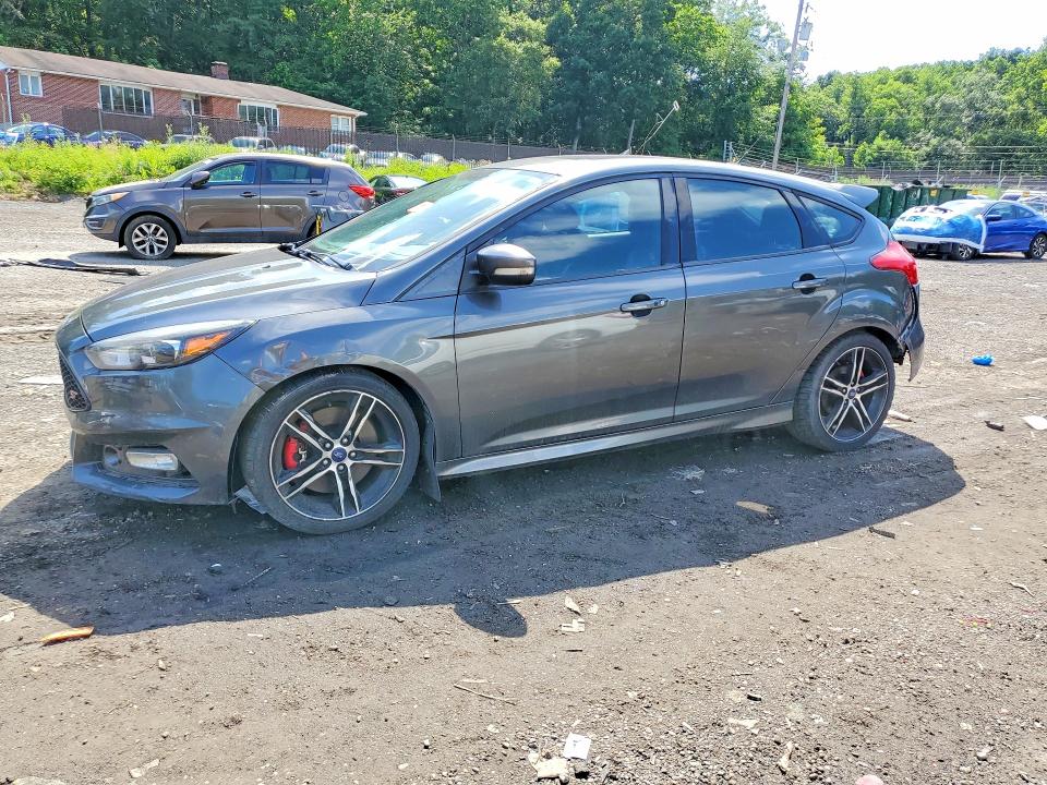FORD FOCUS 2017 with VIN 1FADP3L9XHL262679 - Photo from auction