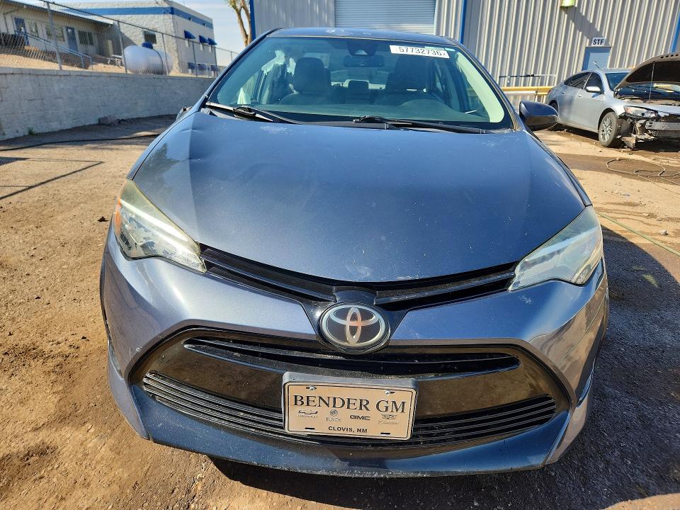 Photo 5 from auction – 2018 TOYOTA COROLLA with VIN 5YFBURHE4JP771151
