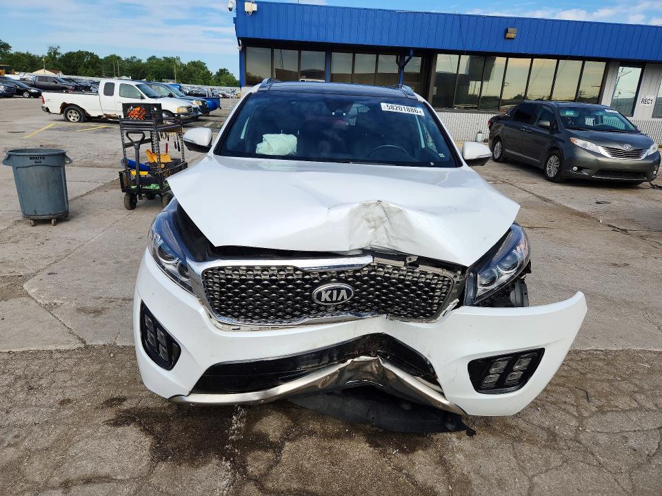 Photo 5 from auction – 2016 KIA SORENTO with VIN 5XYPKDA17GG114623