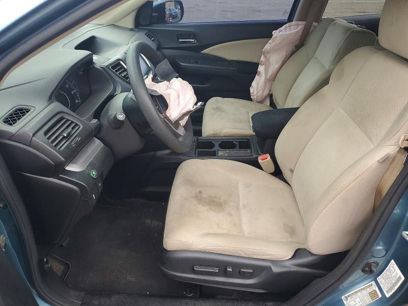 Photo 7 from auction – 2015 HONDA CR-V with VIN 2HKRM3H56FH542518