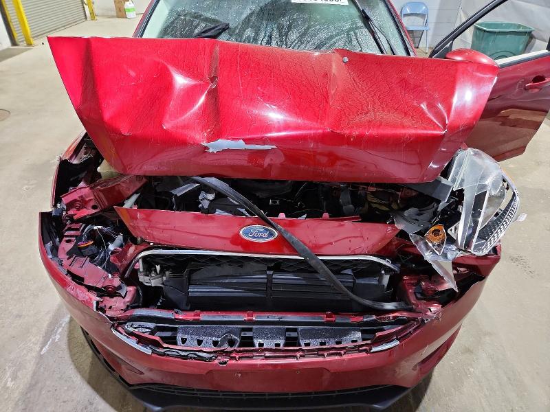 Photo 11 from auction – 2016 FORD FOCUS with VIN 1FADP3K29GL394142