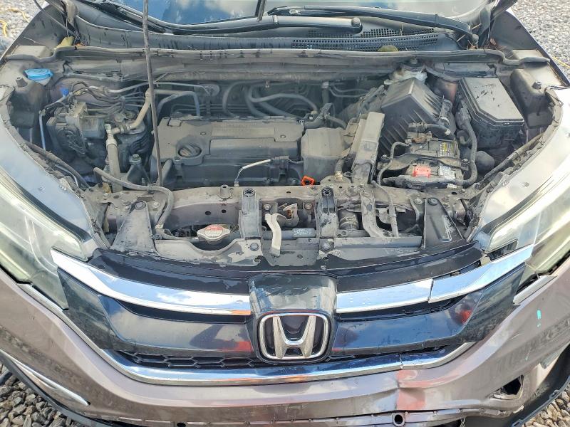 Photo 12 from auction – 2015 HONDA CR-V with VIN 3CZRM3H57FG700996