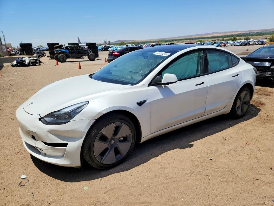 TESLA MODEL 3 2021 with VIN 5YJ3E1EA7MF989590 - Photo from auction