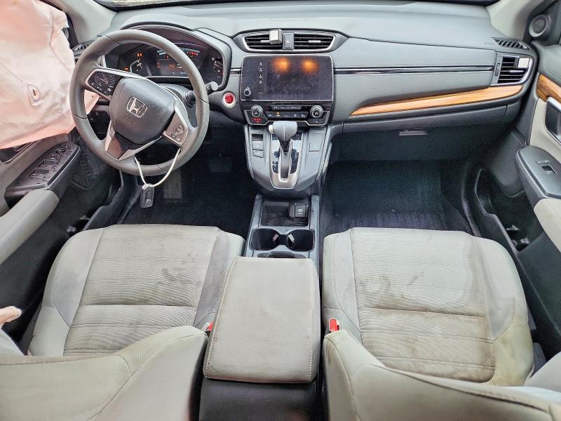 Photo 8 from auction – 2018 HONDA CR-V with VIN 7FARW1H59JE021349