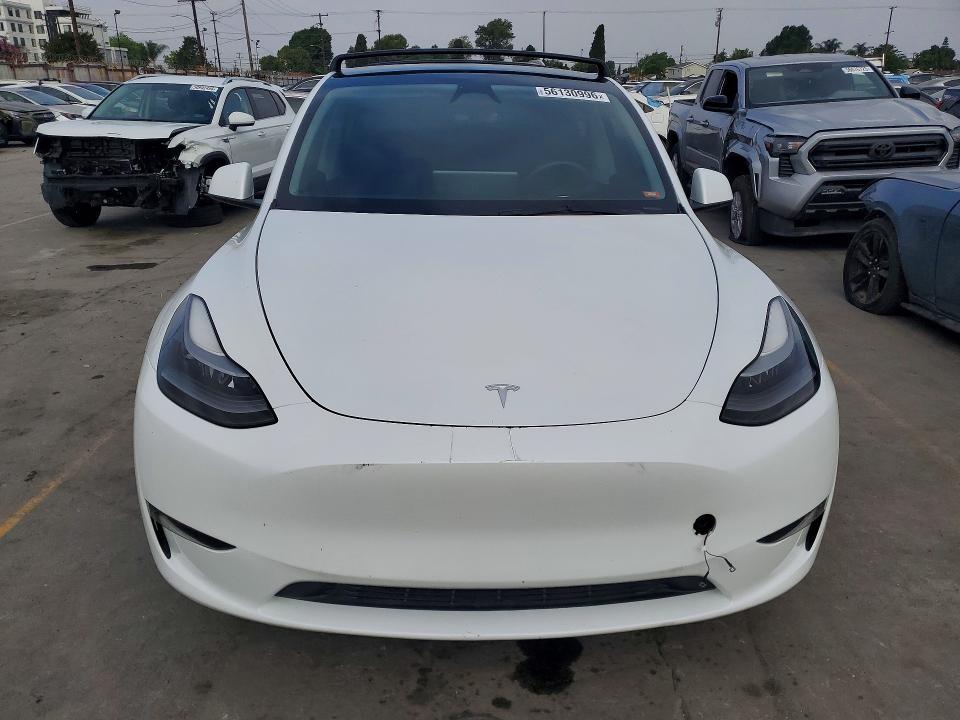Photo 5 from auction – 2023 TESLA MODEL Y with VIN 7SAYGAEE1PF881184