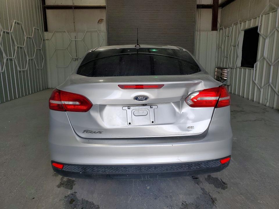 Снимка 6 от търг – 2018 FORD FOCUS с VIN 1FADP3F20JL214628