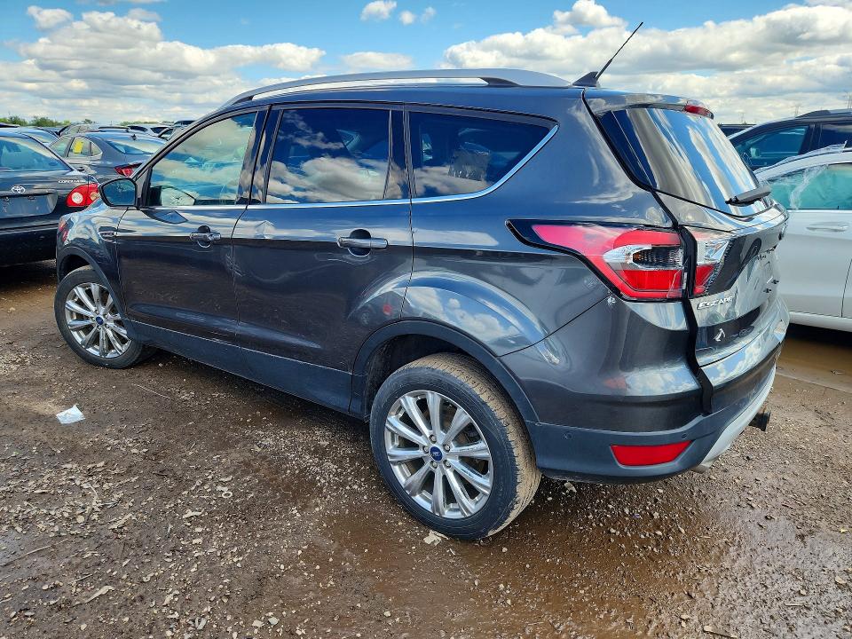 Photo 2 from auction – 2018 FORD ESCAPE with VIN 1FMCU9J95JUD34890