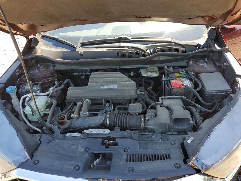 Photo 11 from auction – 2018 HONDA CR-V with VIN 2HKRW2H54JH694441